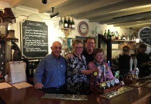 Cheryl and friends 'pulling a pint' at the Kings Arms, Mickleton